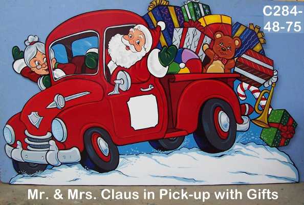 C284Mr. & Mrs. Claus in Pick-Up with Gifts
